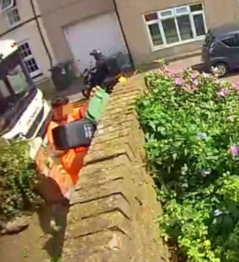 CCTV footage captures another refuse worker pouring food waste into the recycling bin, two weeks earlier in Bower Street, Maidstone