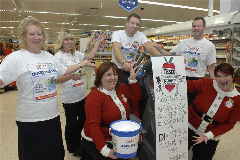 Nicola Heaven and Karen Wardle with Hazel Webb, Sophie Aldworth, Michael Smart and Andrew Sheather were among those who took turns on the exercise bike in Tesco Sheerness