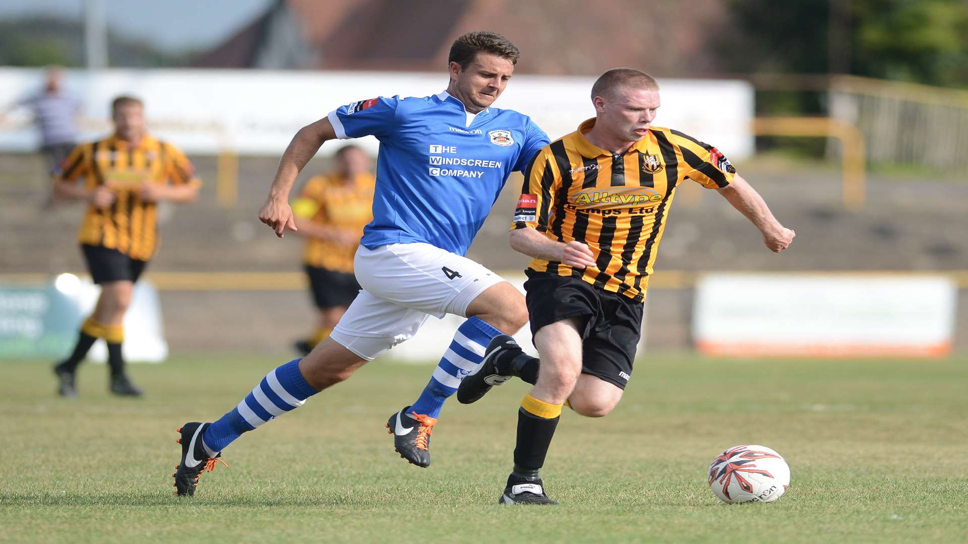 Scott Heard makes ground against Needham Market Picture: Gary Browne