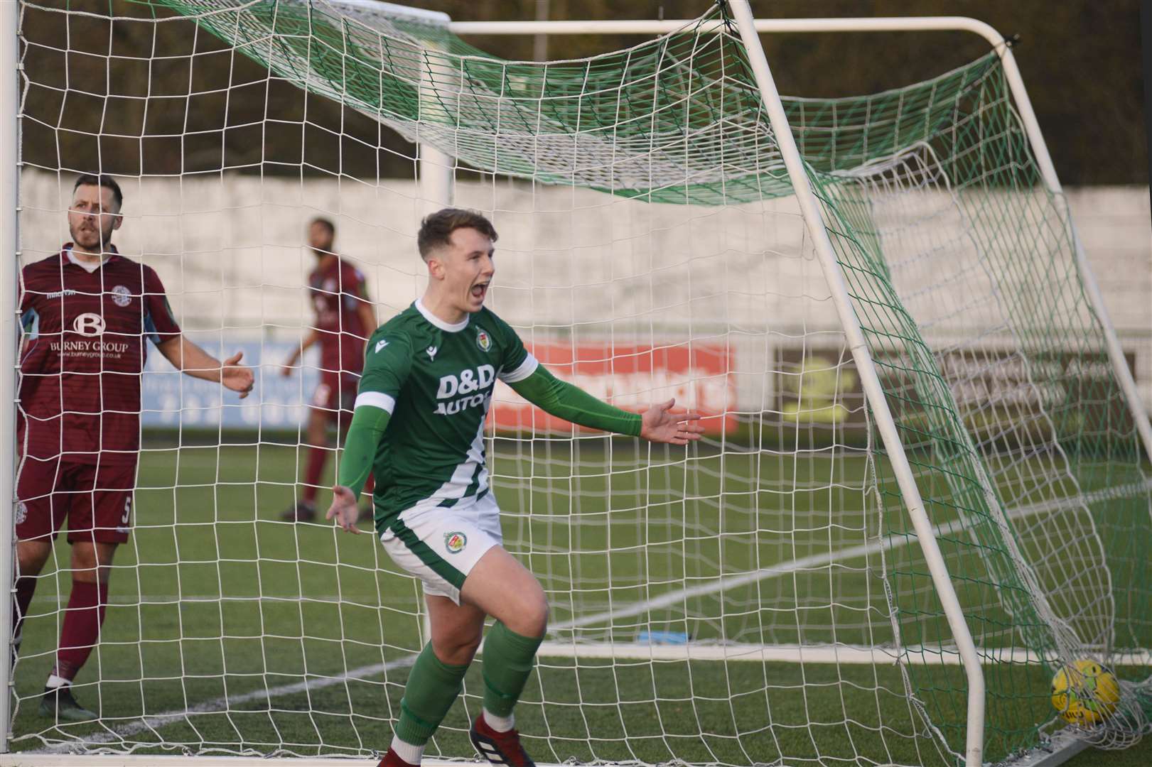 Josh Wisson celebrates his goal for Ashford against Hastings Picture: Paul Amos