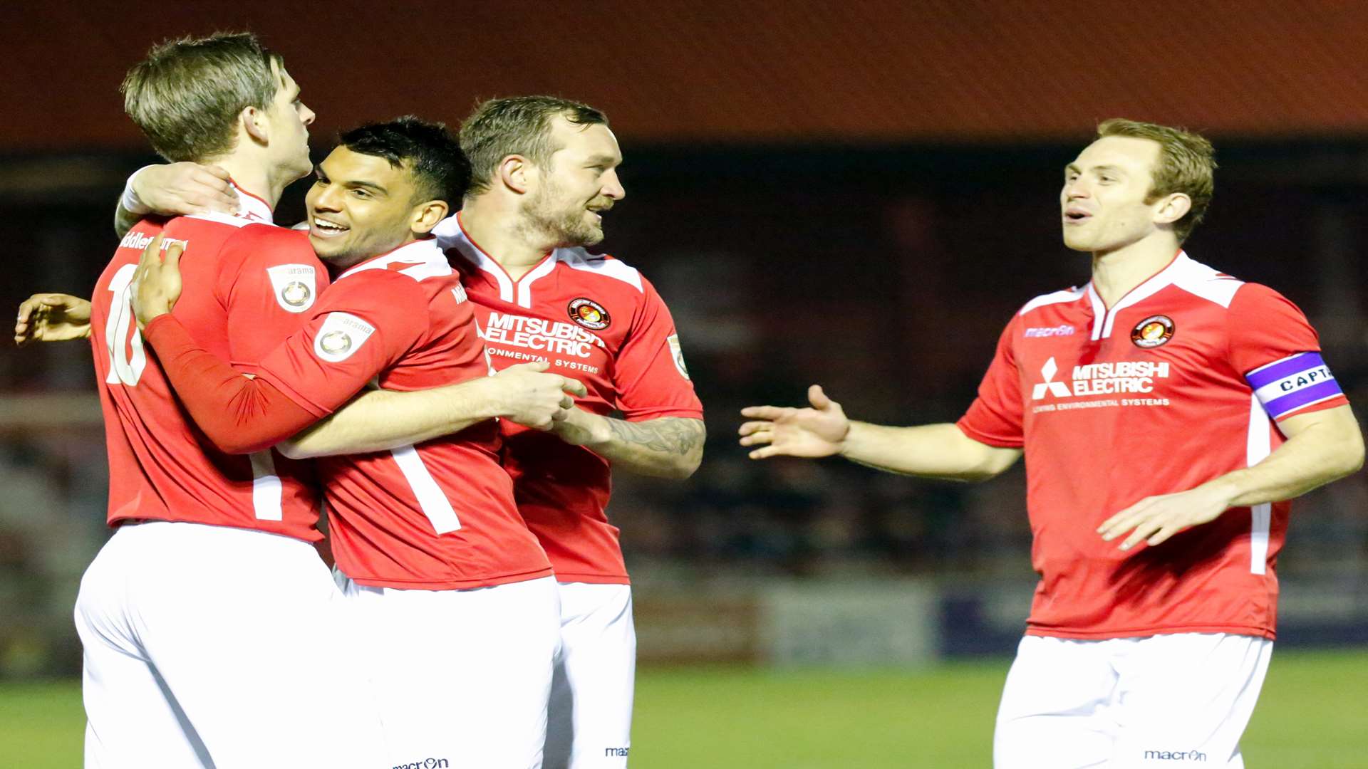 Adam Cunnington congratulated by Theo Lewis, Danny Kedwell and Stuart Lewis Picture: Matthew Walker