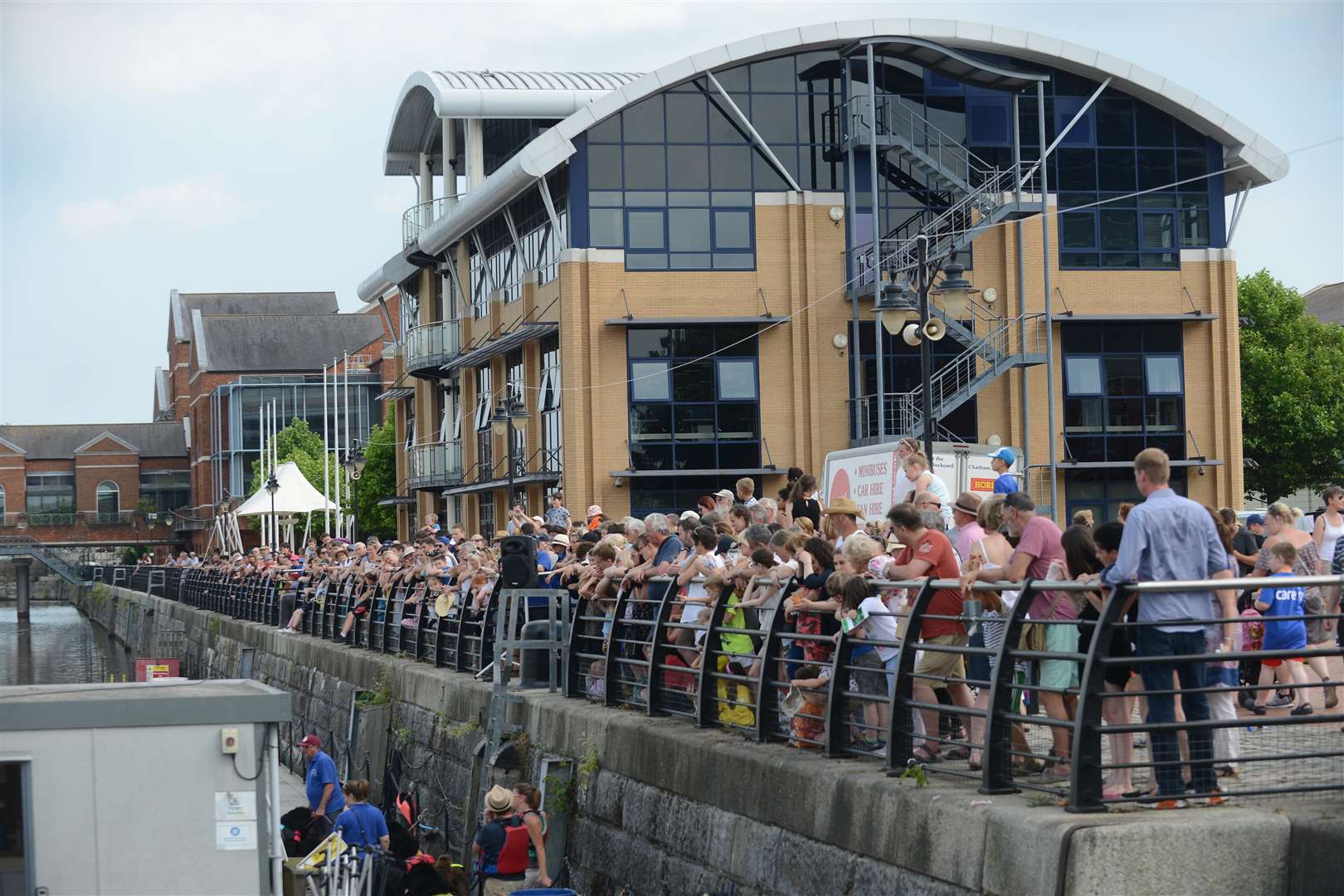 People watching the Splashpals Working Newfoundland Dogs.