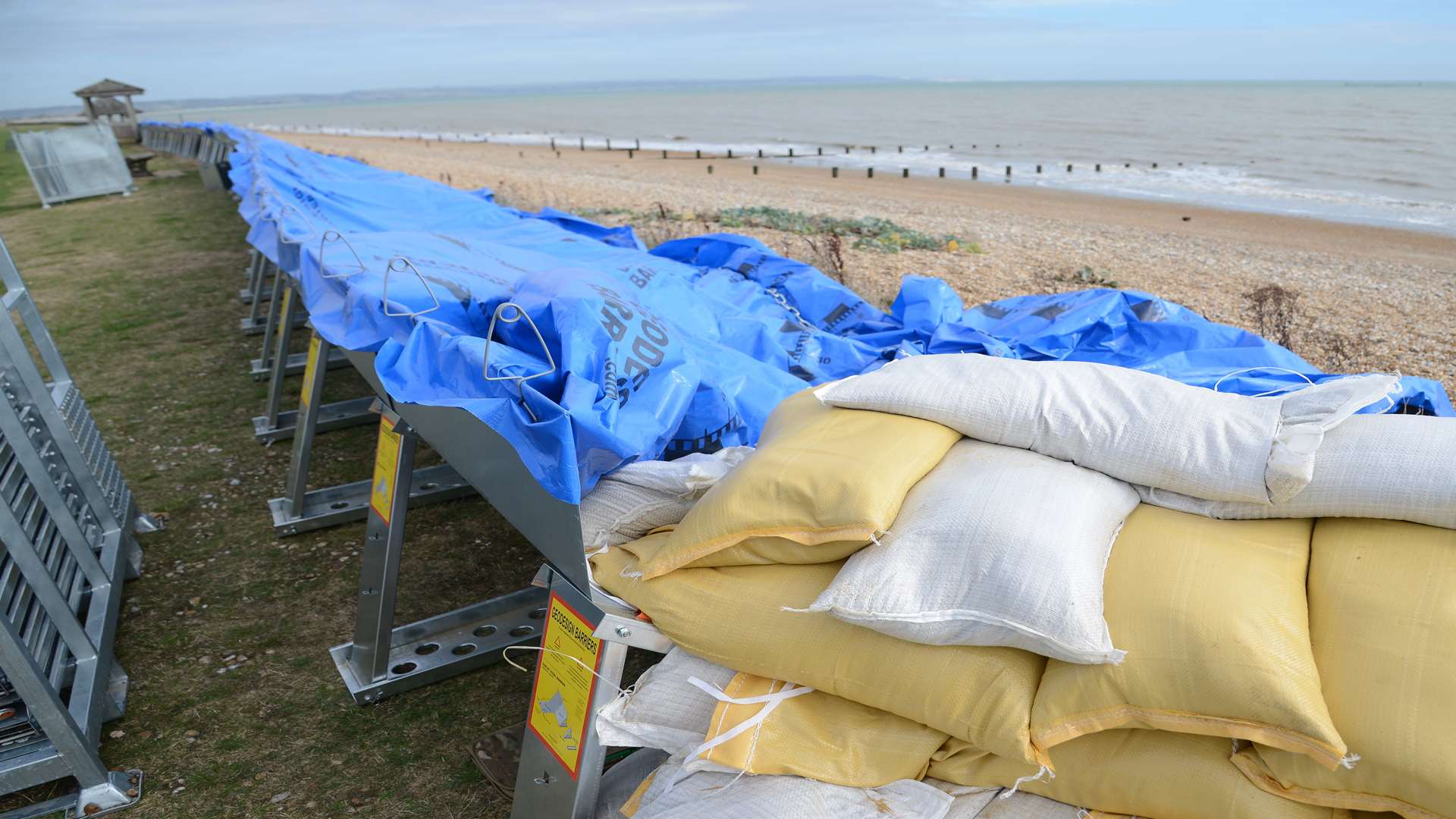 Environment Agency temporary flood defence barrier from a previous tidal surge.