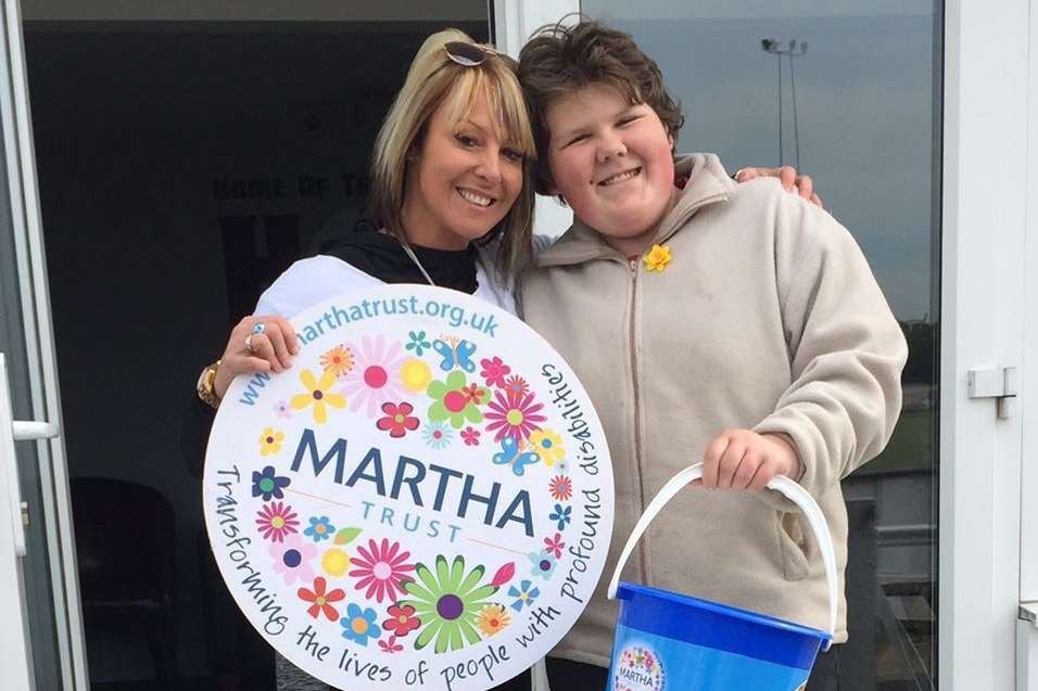 Volunteer Bookatie Thompson lent a hand, with Martha Trust fundraising and events officer Kerry Rubins (left)