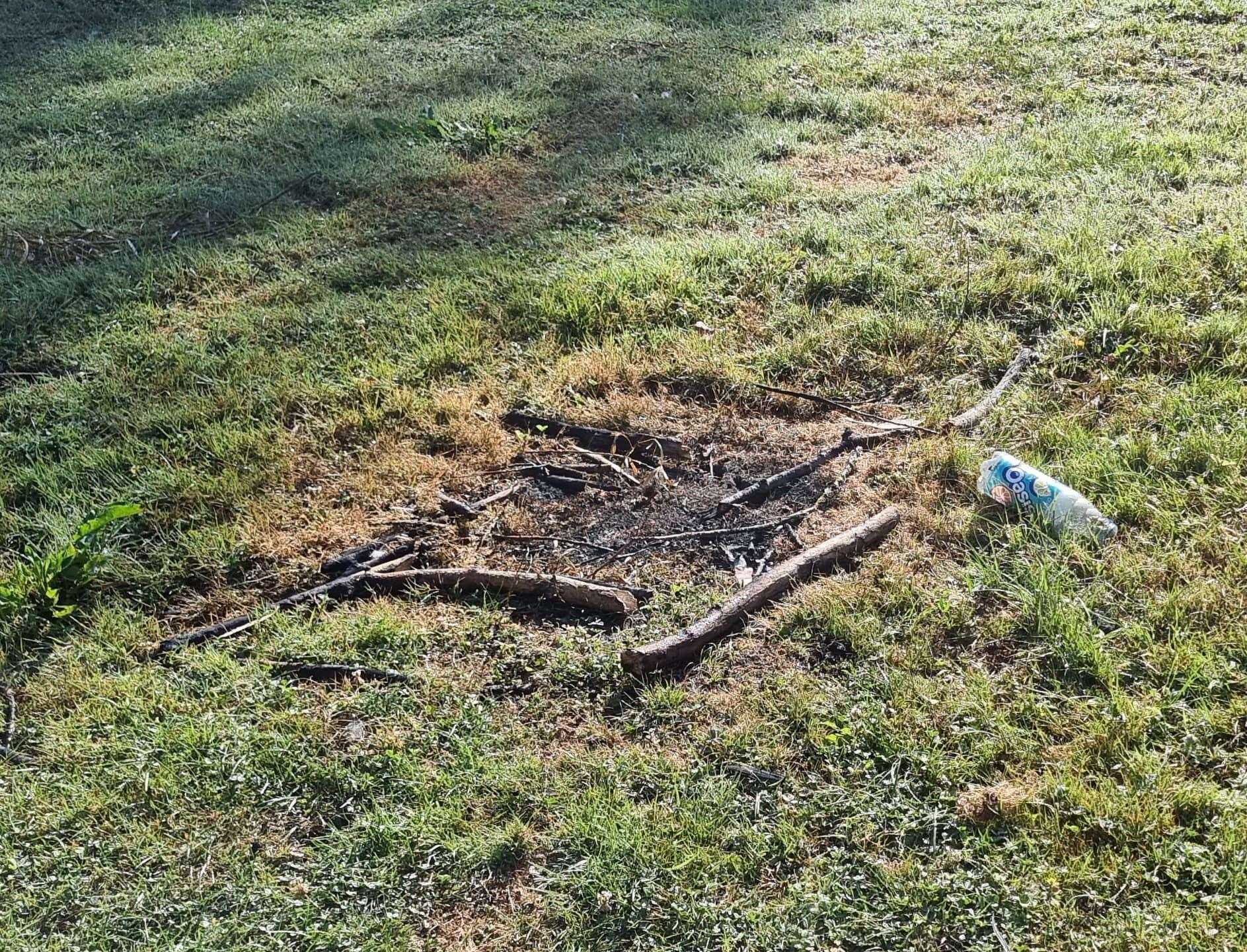 Mr Higgins was walking his dog when he noticed two piles of ashes where fires had been started