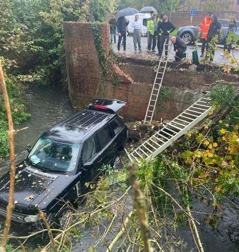 The Range Rover left the road and ended up in the Great Stour. Picture: Colin Walker