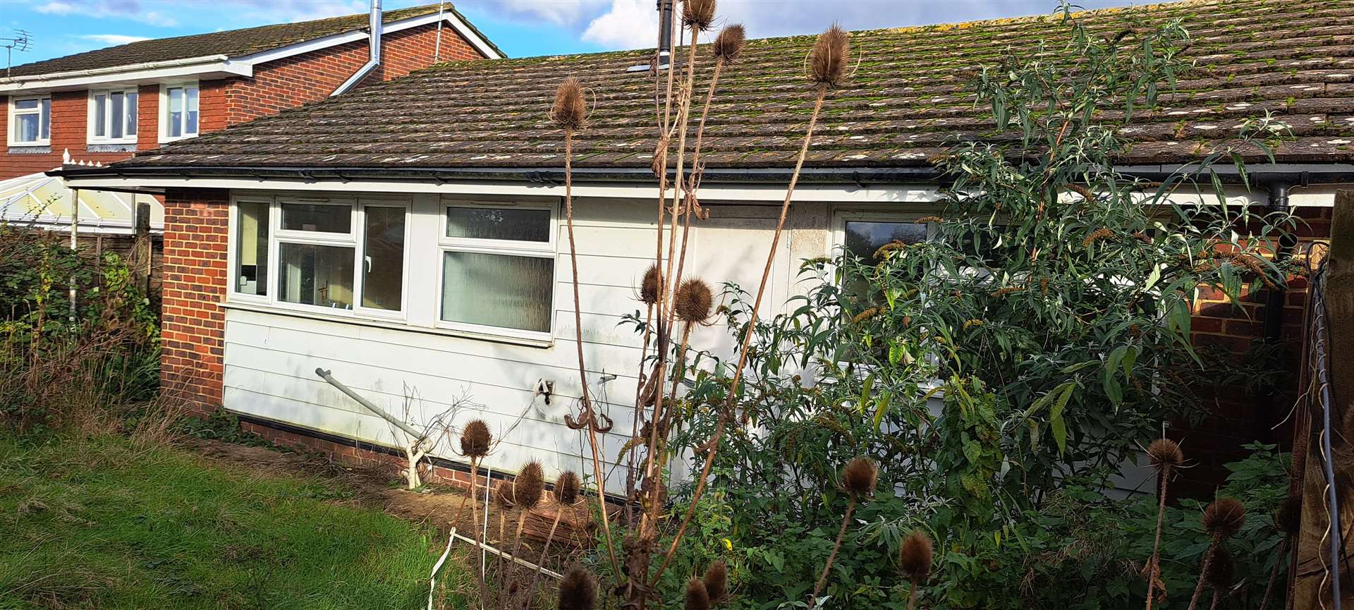 A rear view of the home - vacant for two years