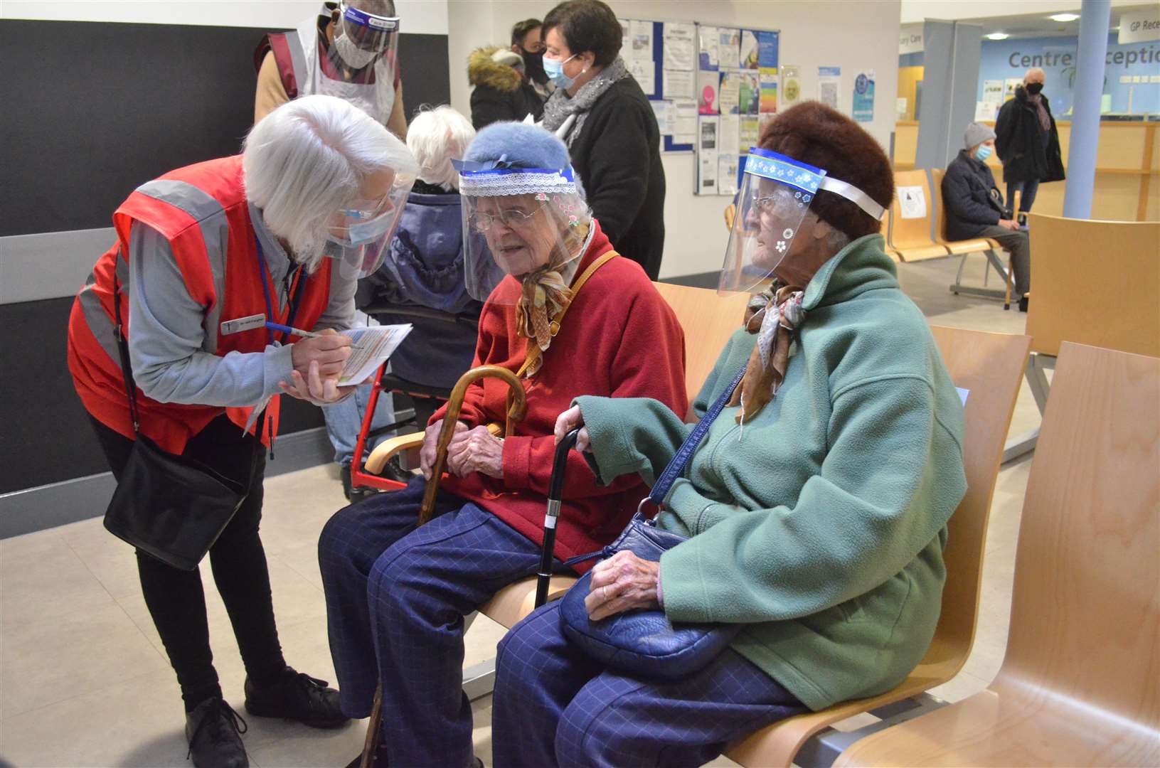 Twins Dorothy Sivyer and Kathleen Whitehead, from Medway, who are 100 both received their coronavirus vaccine jabs in Rochester. Picture: NHS Kent and Medway CCG