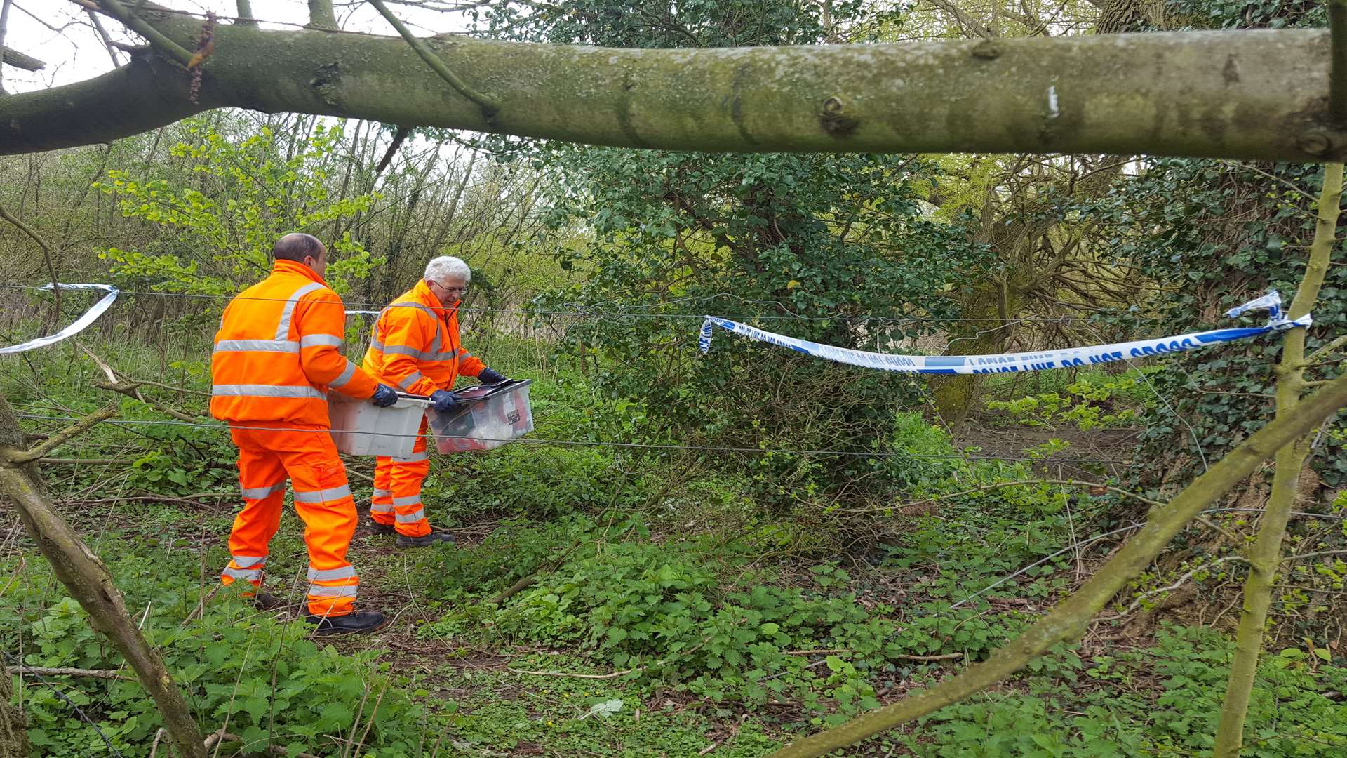 Serco workers clearing the site