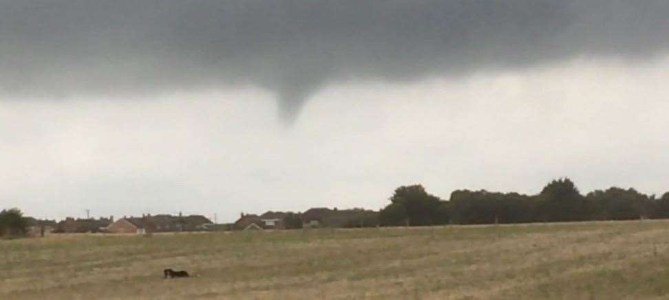 The forming tornado could be seen near the River Thames behind Cliffe. Picture: John Wassell