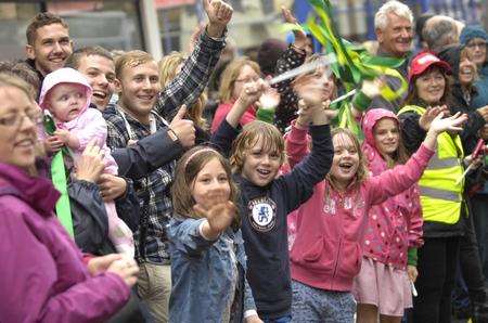 Crowds turned out in Dover for Olympic torch celebrations despite the wet weather. Picture: Gary Browne