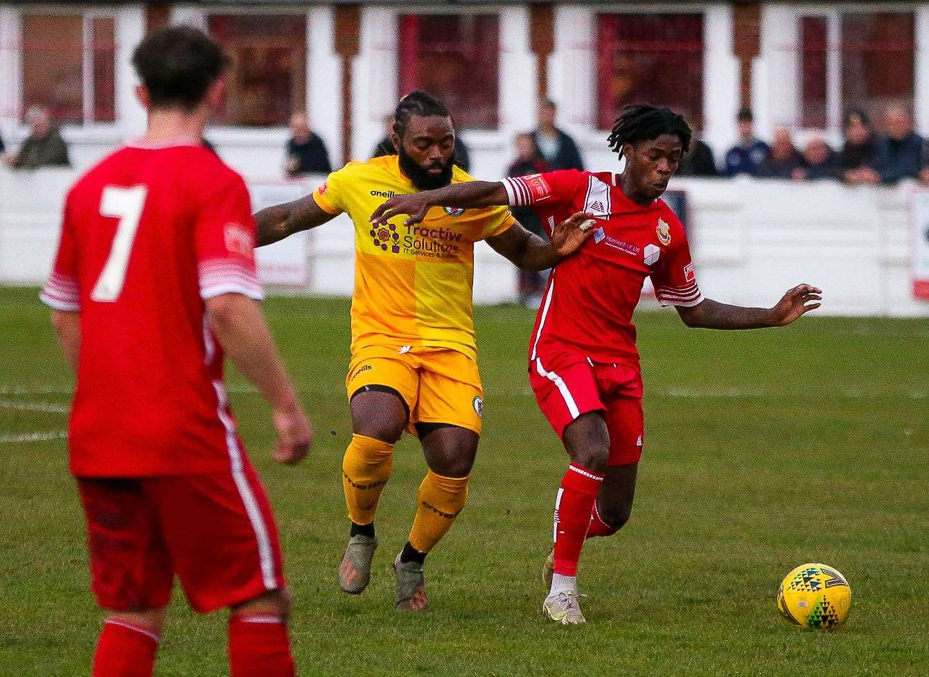 Whitstable's Victor Aiyelabola beats Burgess Hill's Michael Uwezu to the ball last weekend. Picture: Les Biggs