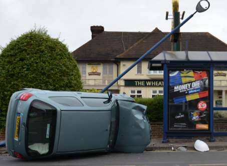 The car flipped over near the Wheatsheaf. Picture: Artjoms Buka