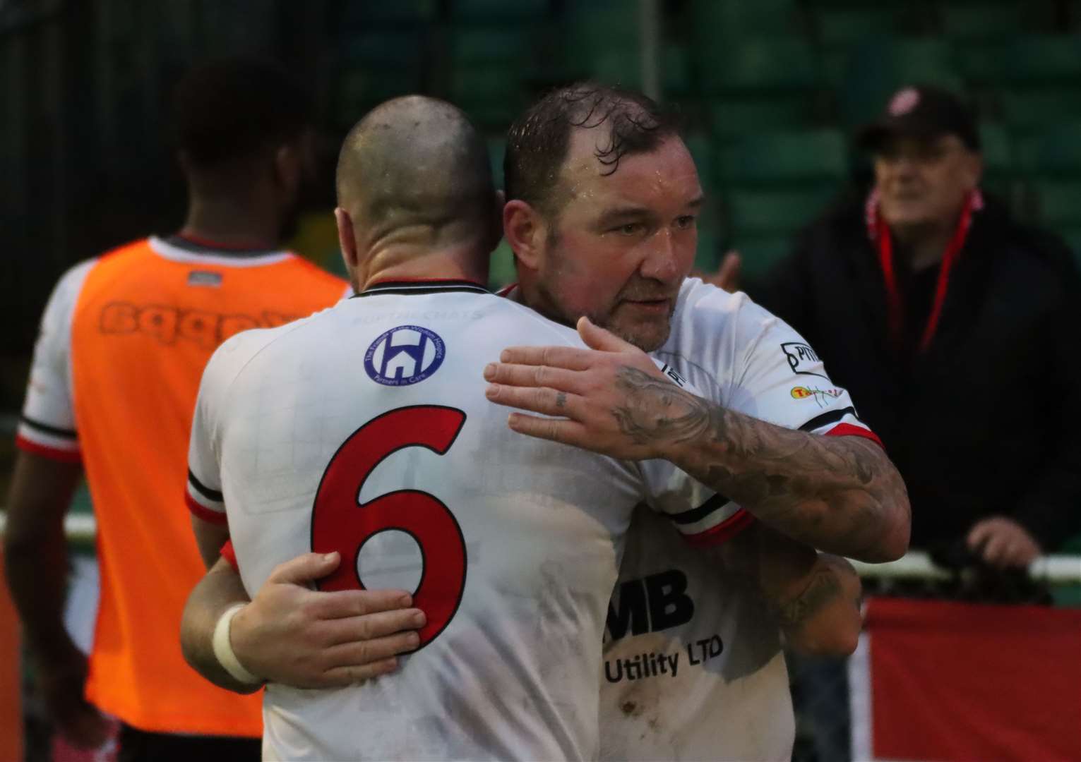 Danny Kedwell congratulated by new signing James Dunne at Whitehawk Picture: Max English @max_ePhotos