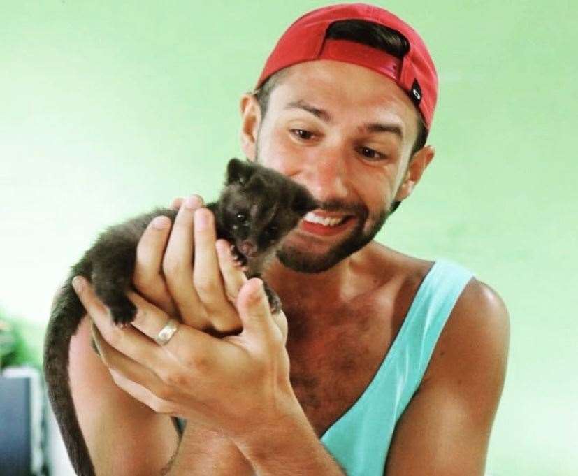 Mark with a one-month old Luwak, producer of the most expensive coffee in the world