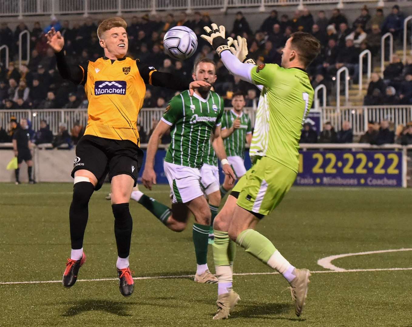 Maidstone United striker Jack Barham challenges Braintree keeper Billy Johnson during Tuesday night's 1-0 victory Picture: Steve Terrell