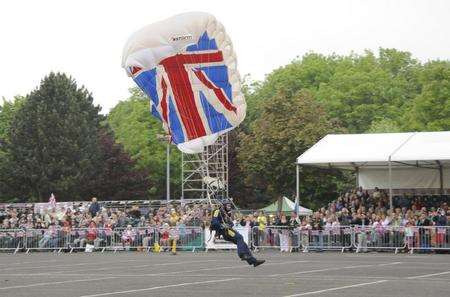 A member of the Tigers Freefall Team suffers a bumpy landing