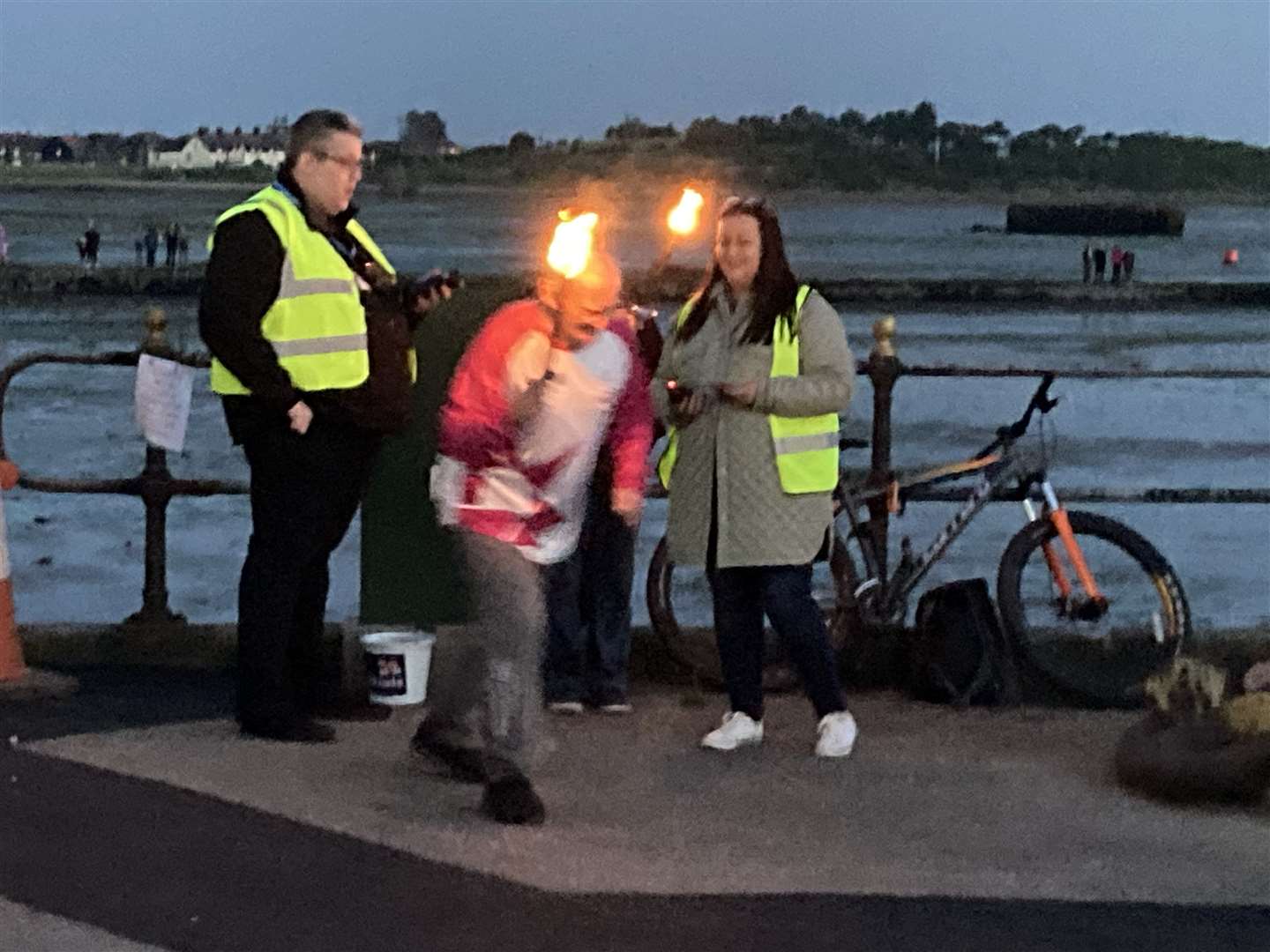 Veteran runner Mick Cattell lit Sheppey's only Platinum Jubilee Beacon at Queenborough. Picture: John Nurden