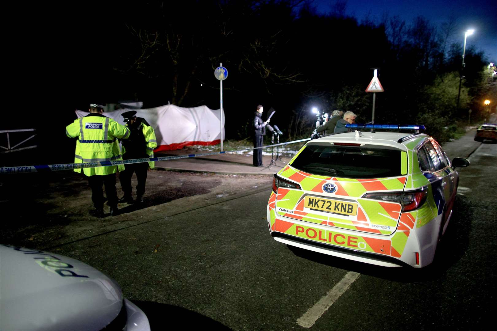 Police at the scene on Ravenscraig Road (Ryan Jenkinson/PA)