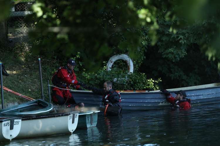 Police forensic officers gather evidence in the grounds of Lullingstone Castle. Pic: Yui Mok/PA