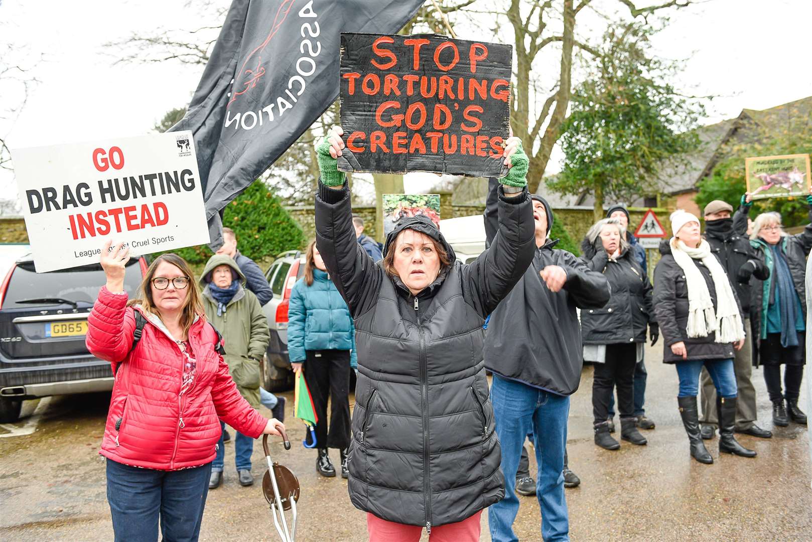 Hunt saboteurs gathered in Elham holding placards