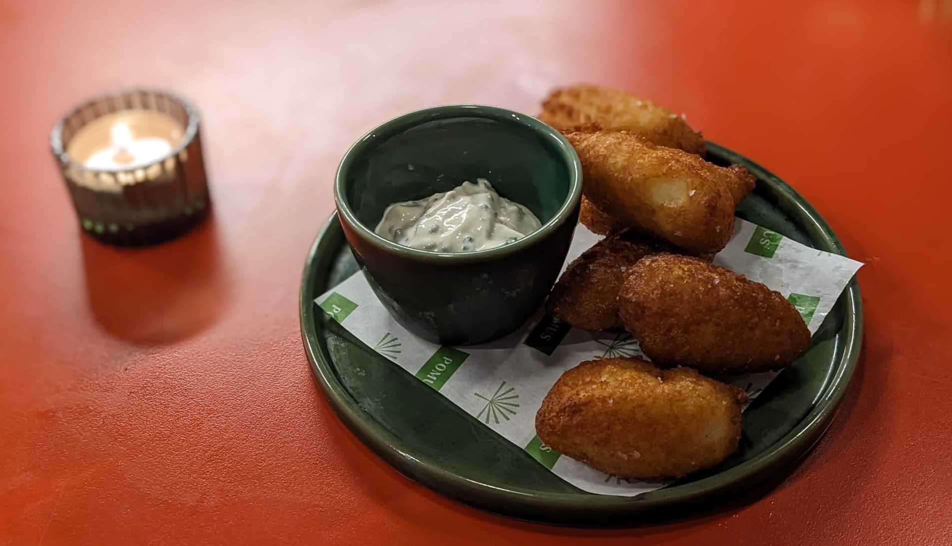 Pomme dauphine were served with a sour cream and chive dip