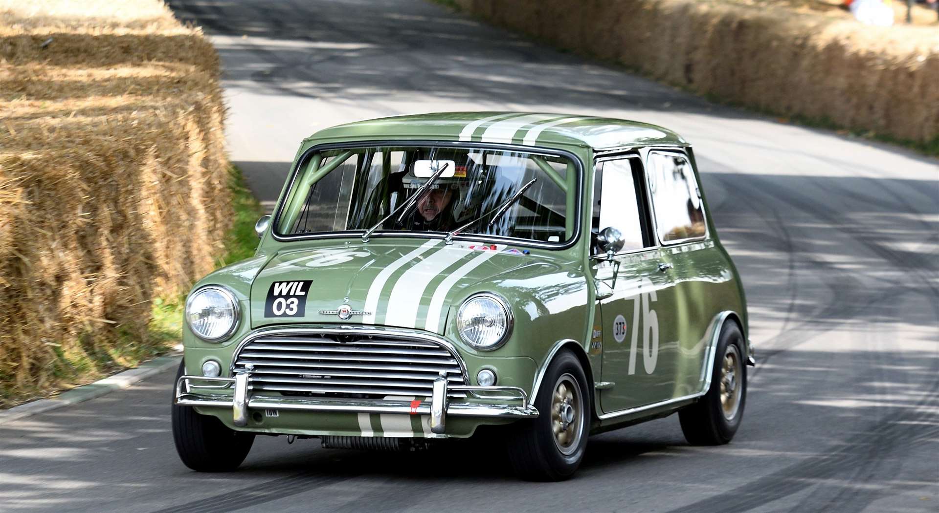 Tenterden's Nick Swift finished fourth in the Goodwood 75 class timed shoot-out driving his 1965 Mini Cooper S. Picture: Simon Hildrew