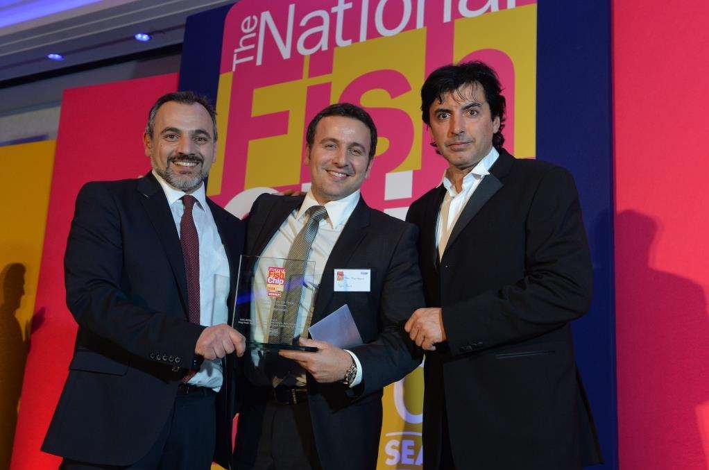 Michael and Theo Papa-Adams and Michelin star chef Jean-Christophe Novelli at the Independent Takeaway Awards at the Lancaster hotel in London