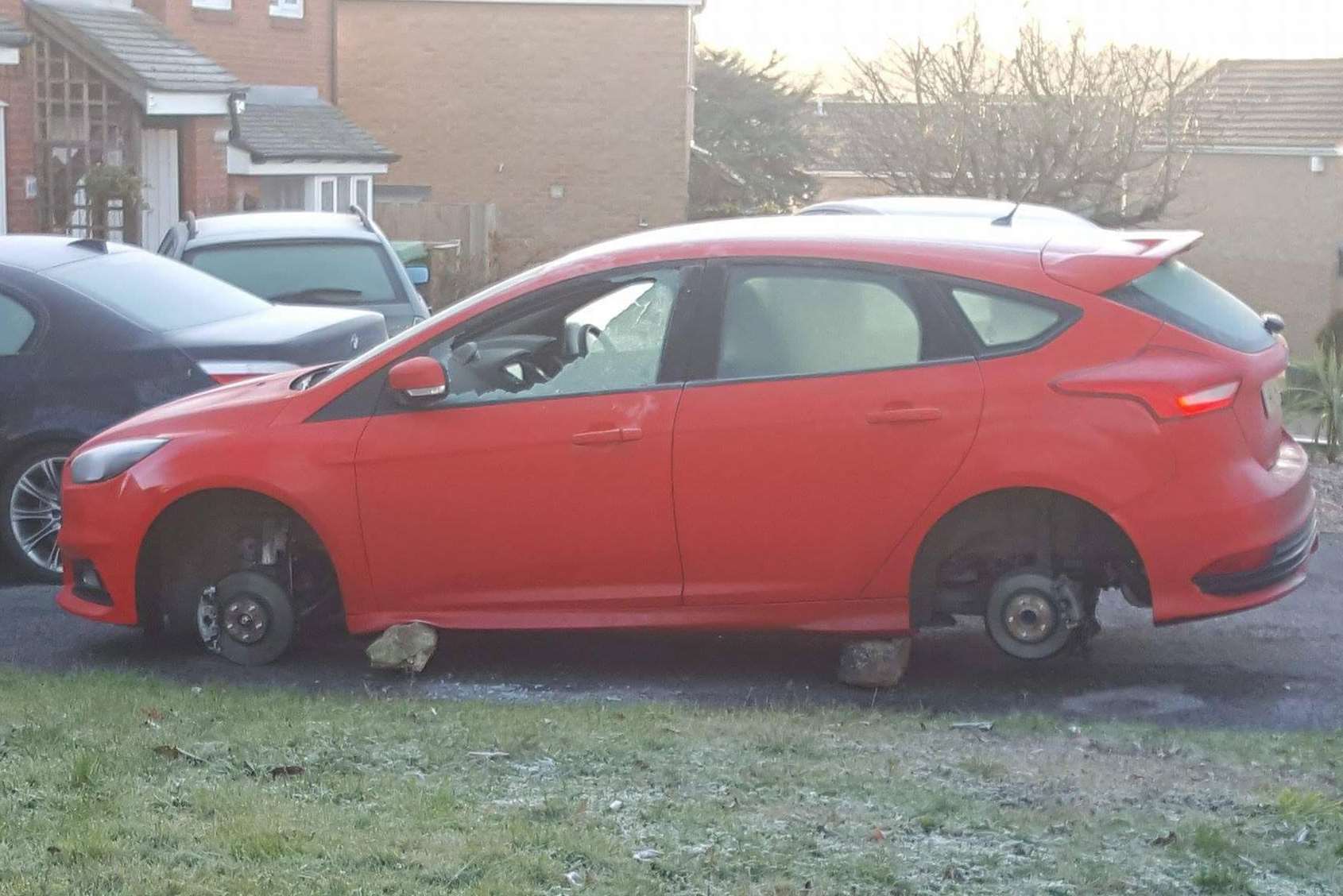 All four wheels were stolen off a car.