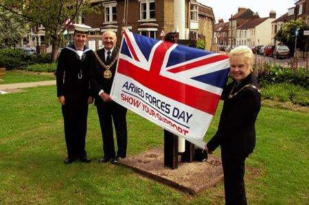 Mayor and Mayoress of Swale Cllr Ben Stokes and Cllr Sylvia Bennett with Mayor's Cadet Oliver Field raise the flag at the council offices in Trinity Road, Sheerness