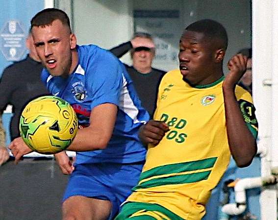 Bradley Stevenson, left, in action for Herne Bay against Ashford. Picture: Keith Davy