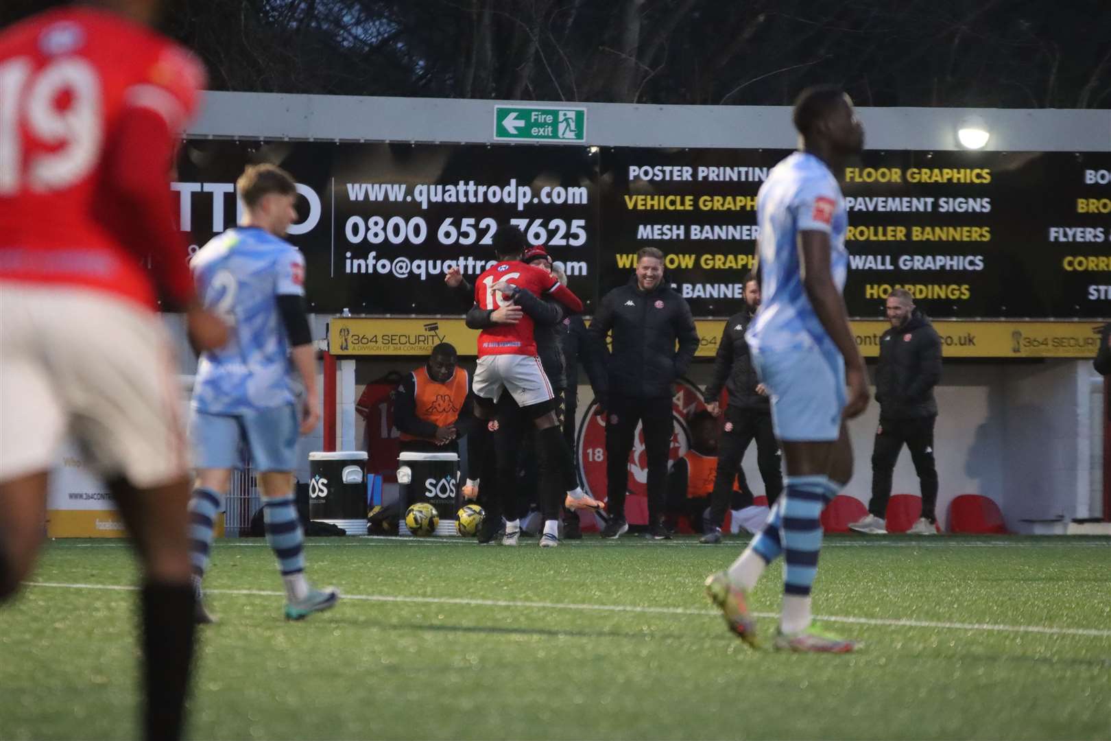 Kareem Isiaka celebrates one of his two goals with manager Kevin Hake Picture: Max English (@max_ePhotos)