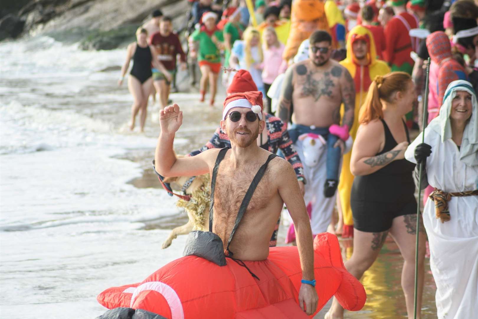 Hardy, brave or completely mad? The dip in Folkestone is organised by the Folkestone, Hythe and District Lions Club. Picture: Shaun Ranger/Folkestone, Hythe and District Lions Club