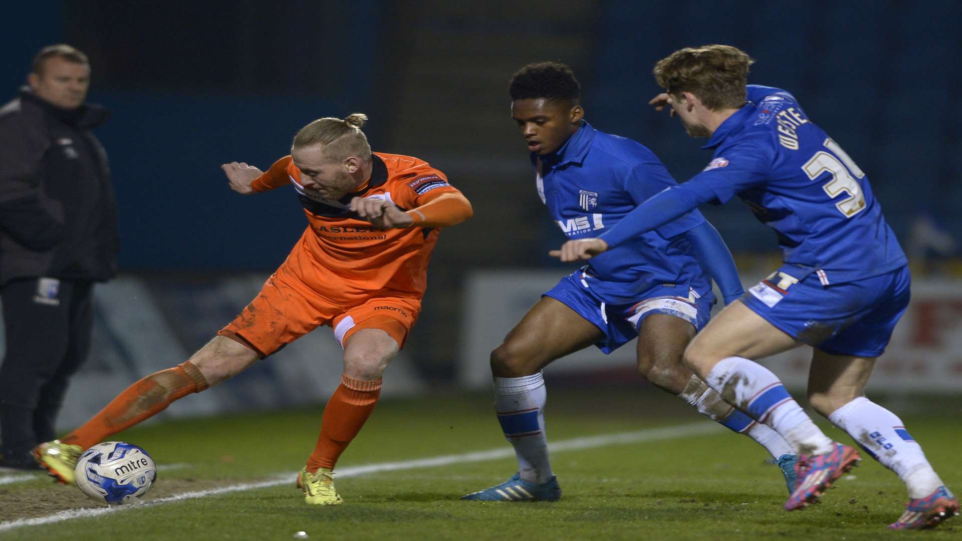 Margate's Ryan James is chased down by Mahlon Romeo and Charlie Webster Picture: Barry Goodwin