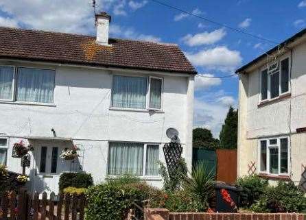 The gap between numbers 11 and 13 Cornwall Close, where the flats could be built