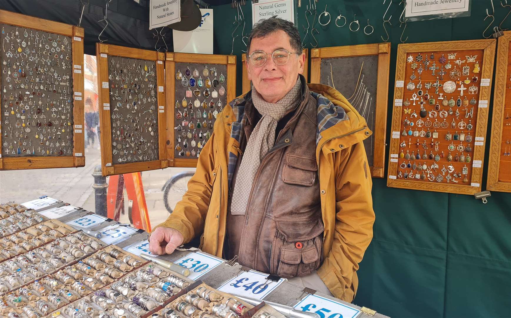 Jewellery maker Attilio Termine at his stall in Canterbury