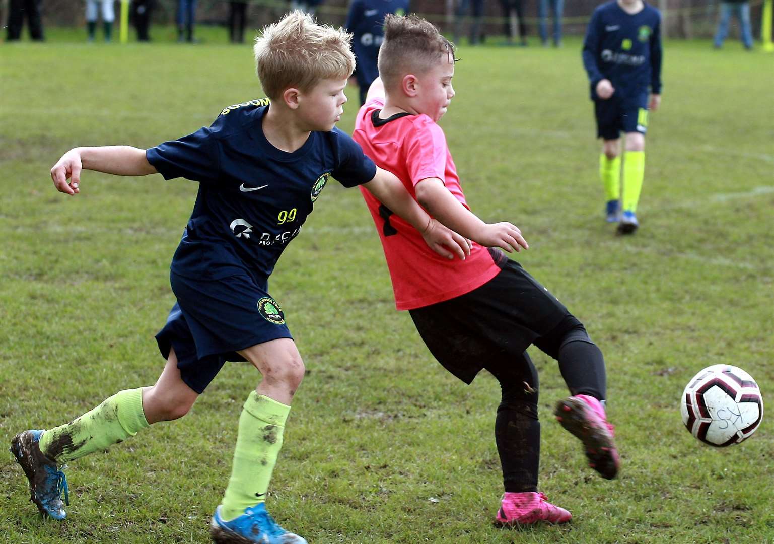 Sheerness East Youth under-9s get to the ball ahead of Cliffe Woods Colts under-9s. Picture: Phil Lee FM18684378