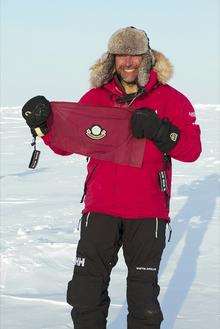 Simon Daglish with the Dukies pennant