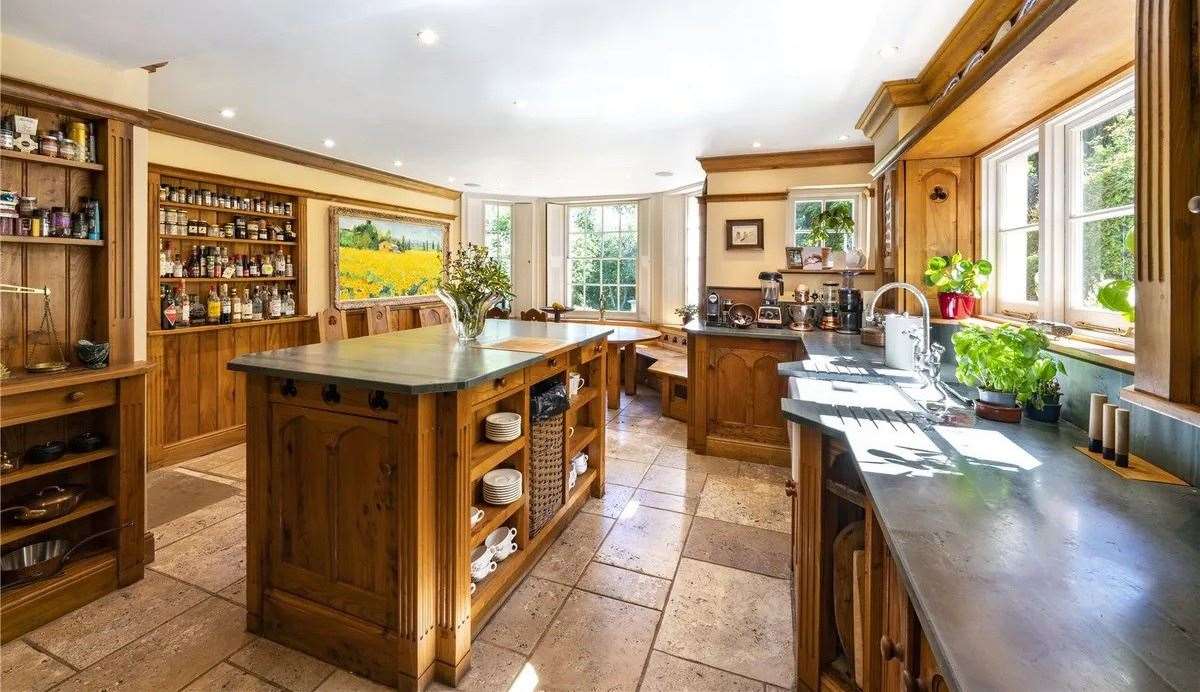 The hand-made kitchen is unique to this property and features high-end appliances. Picture: Savills