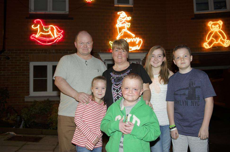 The family with the Christmas decorations that Oakley didn't see at home this year