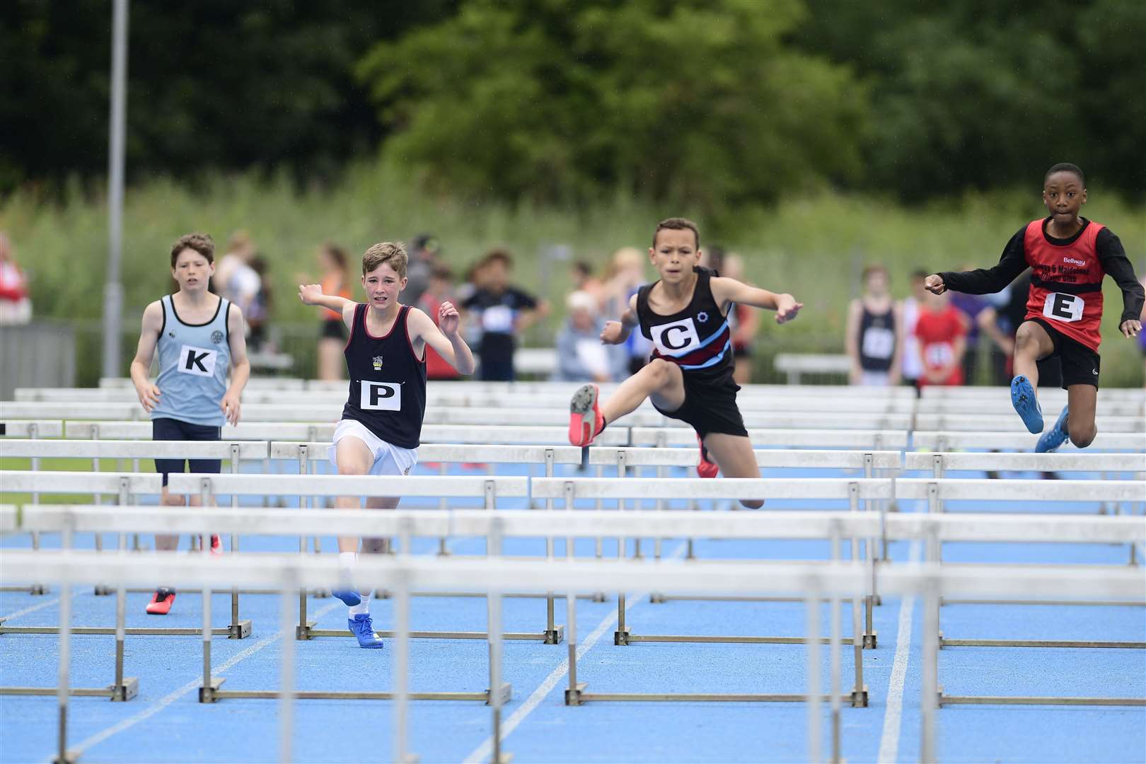 Under-13 75m hurdles. Jamie Ellerton (Blackheath & Bromley) leading the way ahead of Theo Hood (Tonbridge AC), Bukunmi Edun (Medway & Maidstone) and Tom Ravenscroft (Cambridge Harriers) Picture: Barry Goodwin