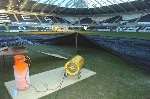 IN VAIN: The ground staff in Swansea tried to thaw out the pitch with industrial heaters before Wednesday night's game with Gillingham. Picture courtesy SOUTH WALES EVENING POST