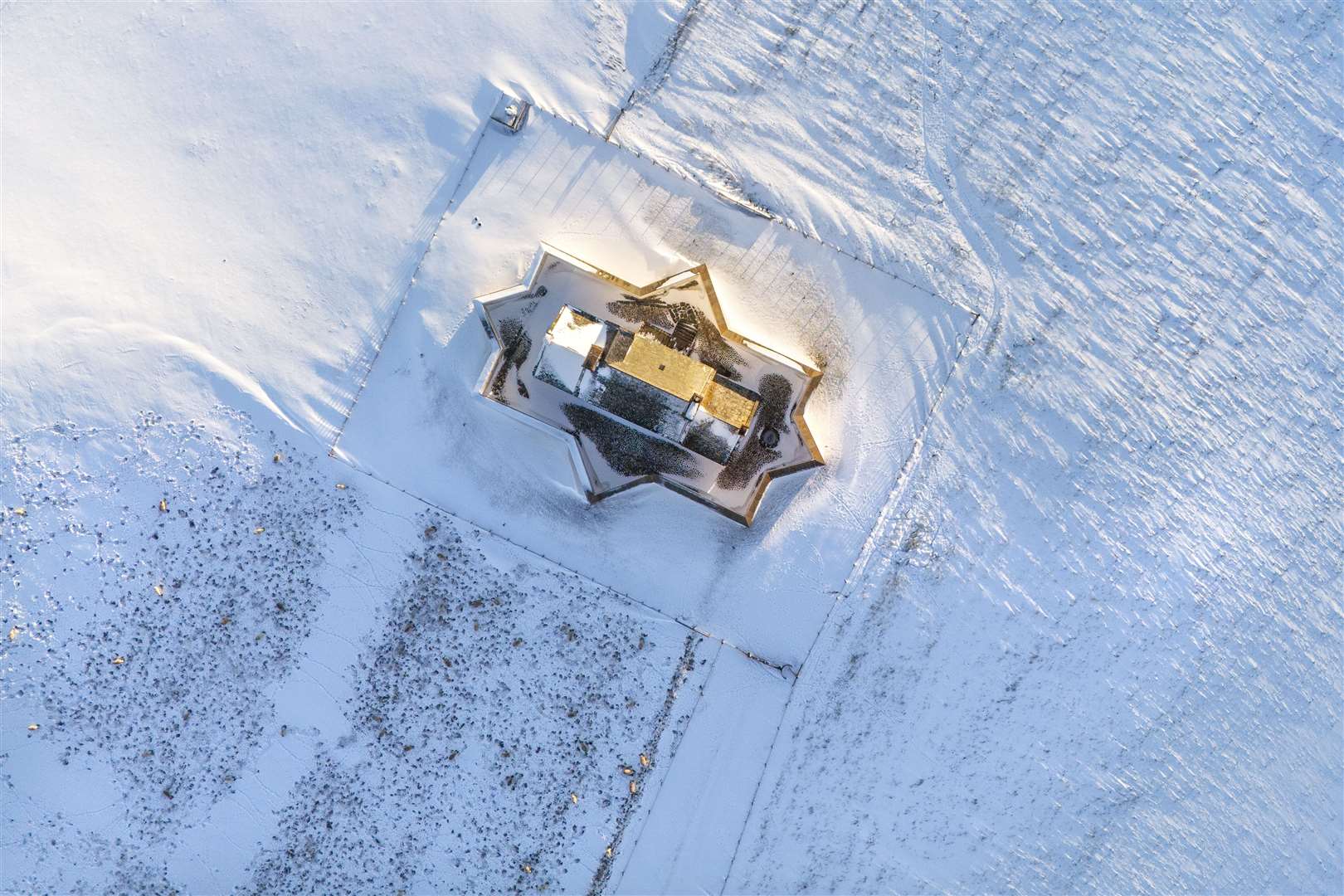 Corgarff Castle in Aberdeenshire, surrounded by snow (Jane Barlow/PA)