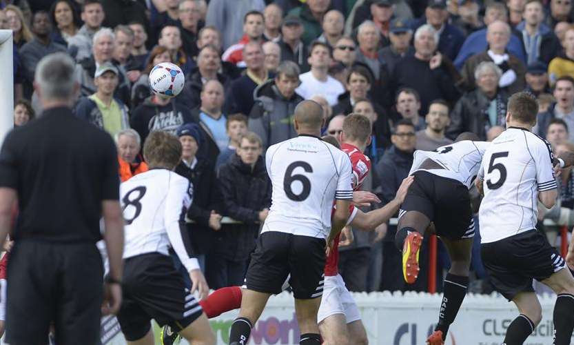 Nathan Elder heads in the winner for Dover. Picture: Andy Payton