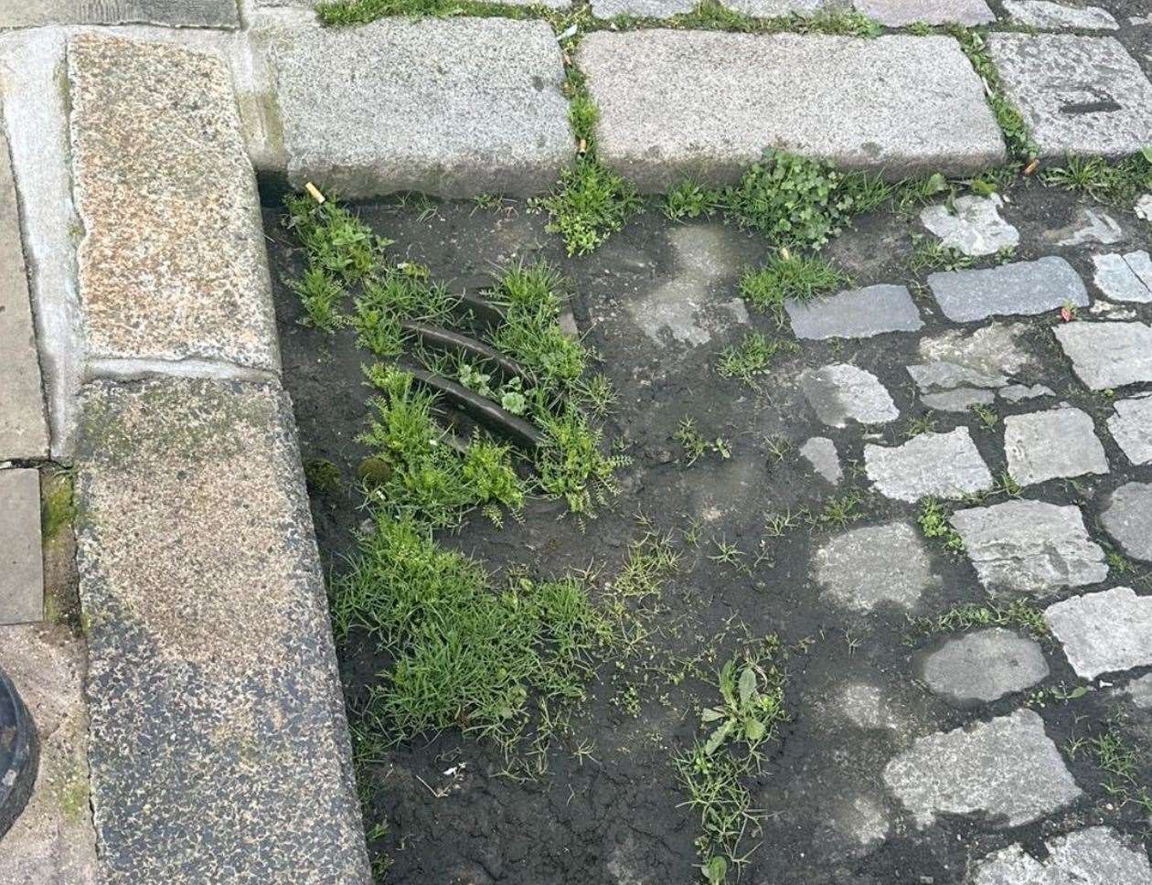 Drains have become clogged with mud and grass. Picture: Andy Burnett