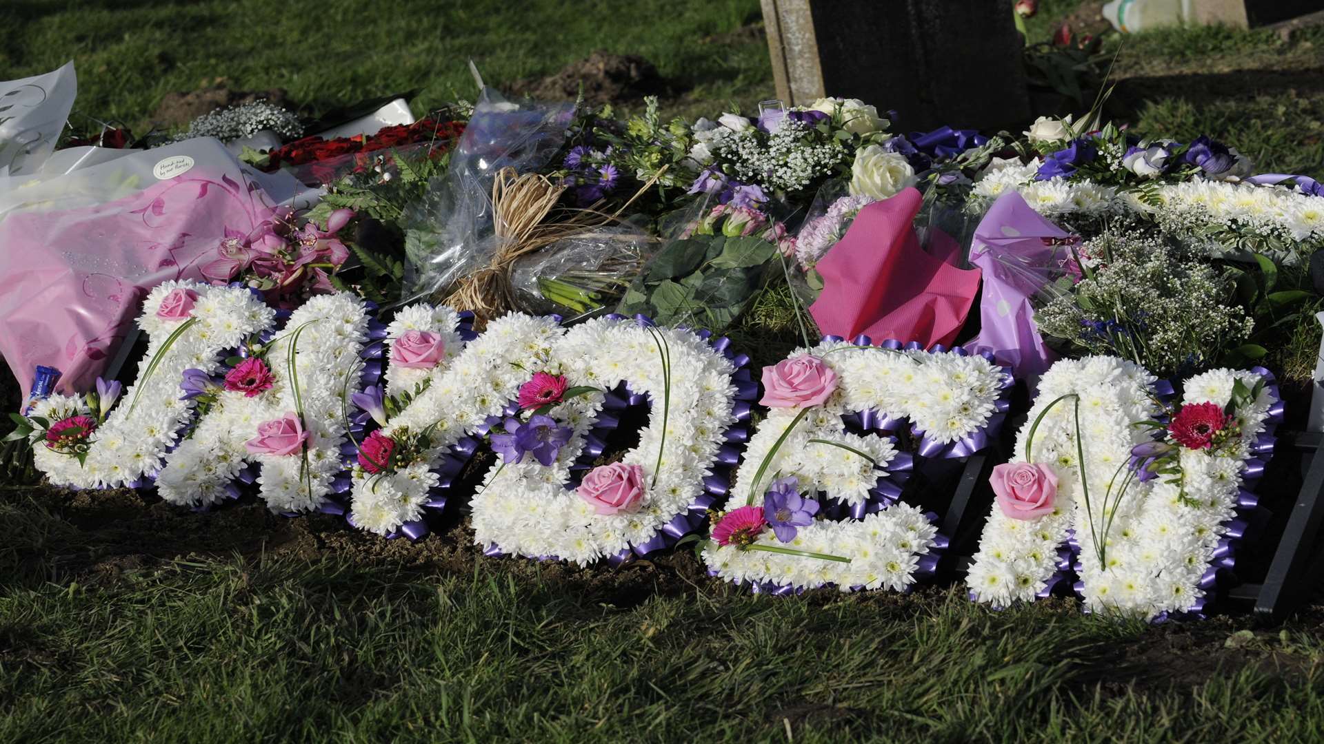 Flowers placed at the grave of Jayden Parkinson at St Martin's Church in Cheriton