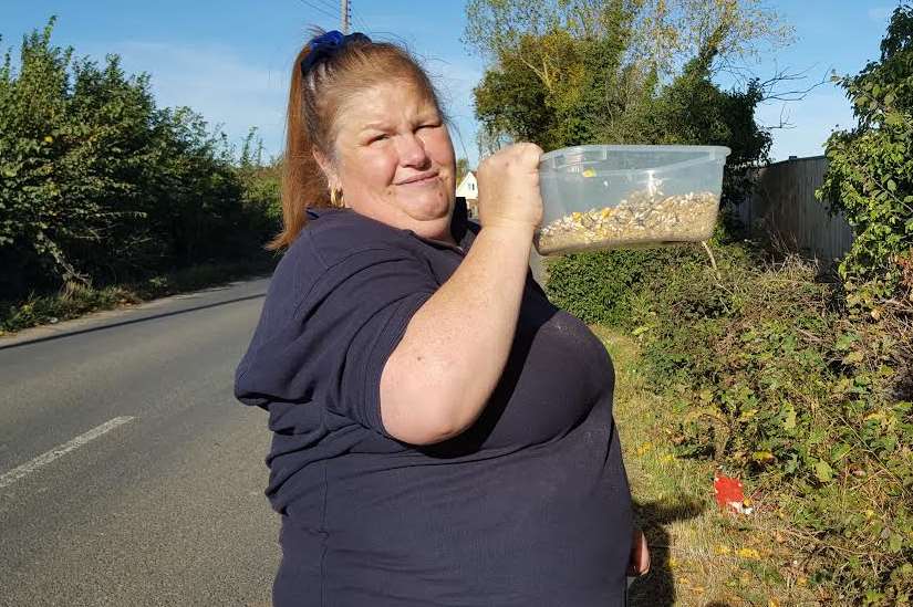 Bird Line Parrot Rescue volunteer Michelle Chantler with a bowl of goodies