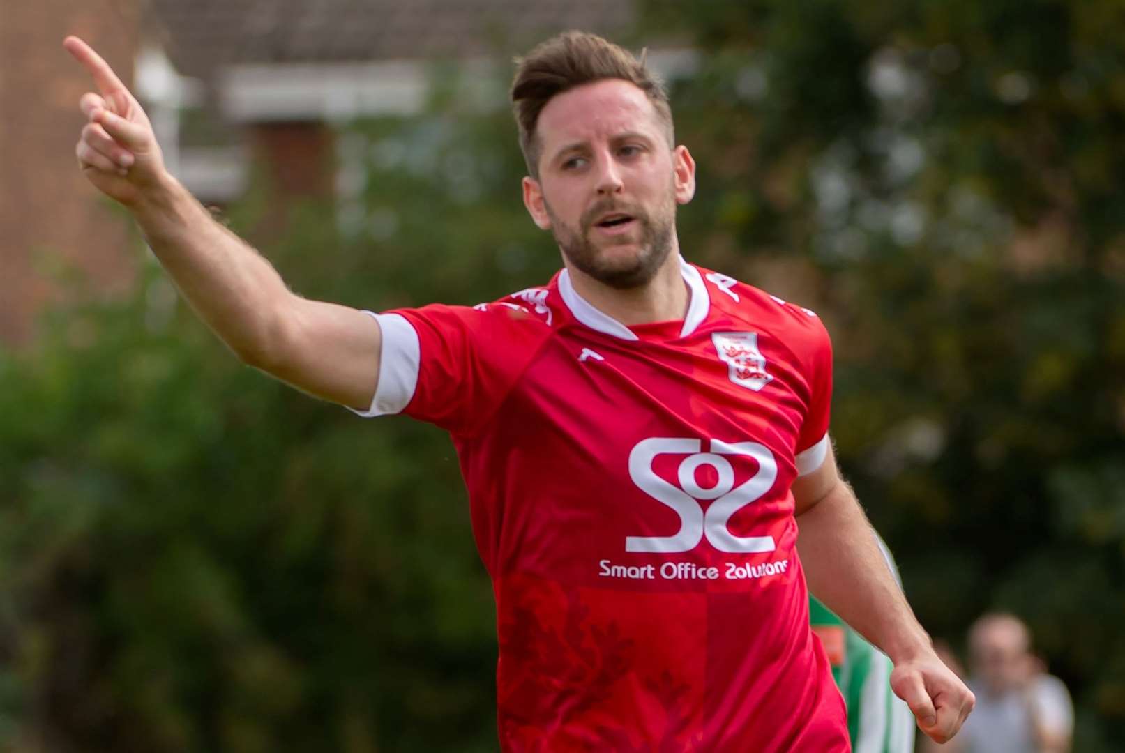 Faversham captain Connor Essam wheels away to celebrate his debut goal in their 3-0 opening-day victory at VCD at the weekend. Picture: Ian Scammell