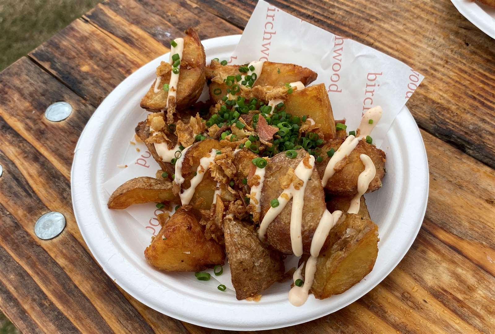 Crispy potatoes with rosemary salt, chives and sriracha mayo from Birchwood