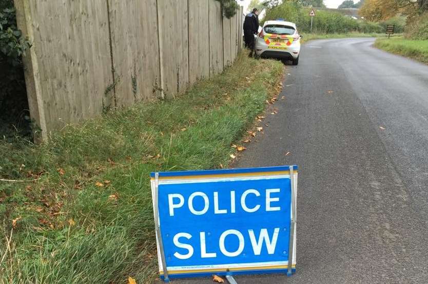 Police at the property in October